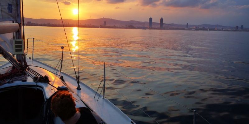 Marriage proposal by sunset on a boat