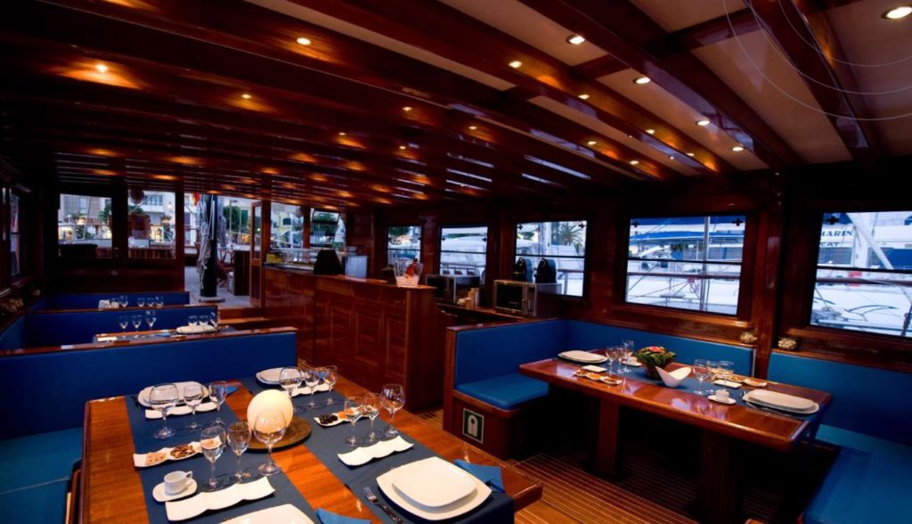 Dine and wine on our Schooner in front of the Barcelona coastline. 